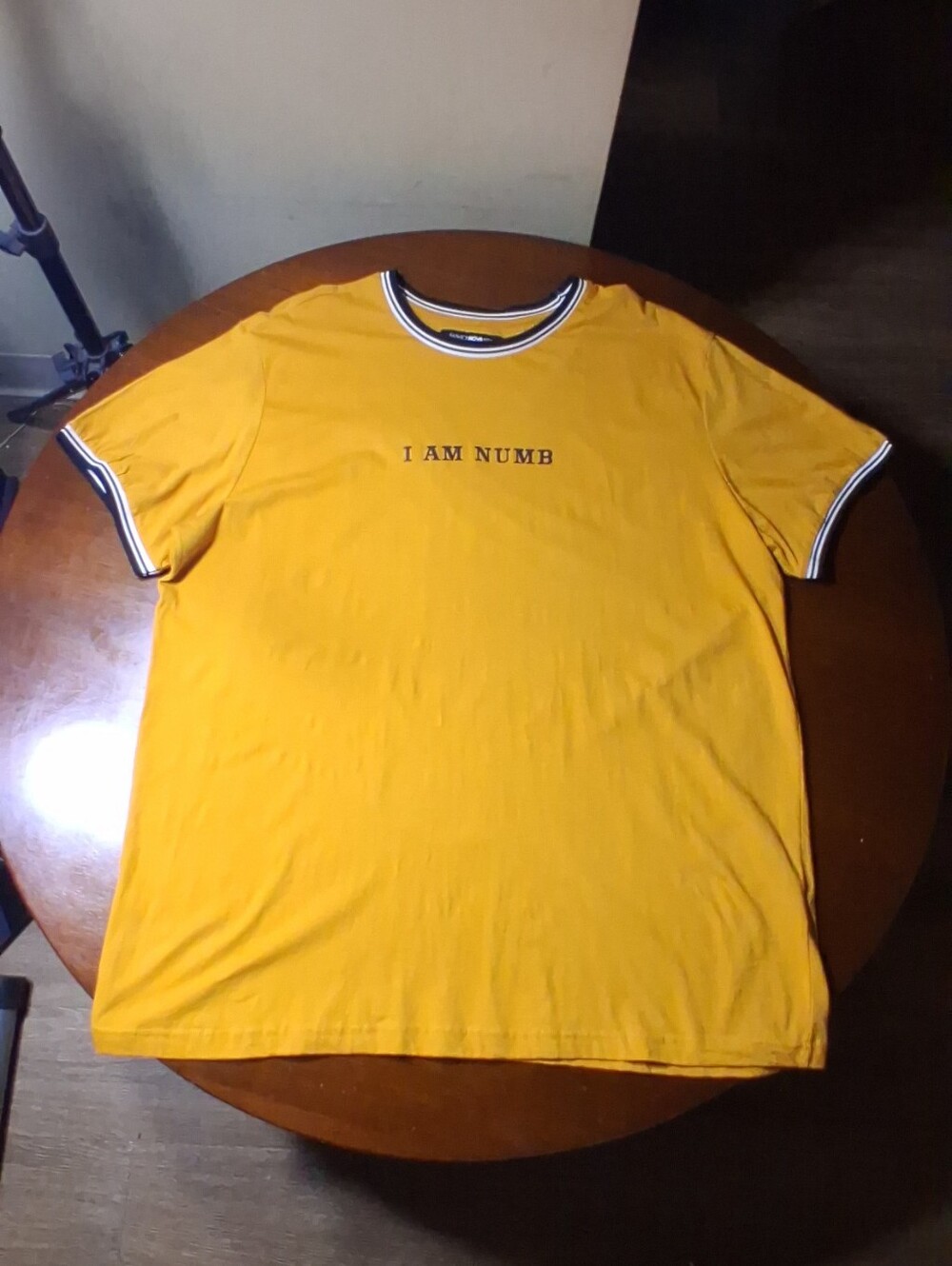 Fashion Nova Men's Gold And Black 'I AM NUMB' Graphic Ringer Tee